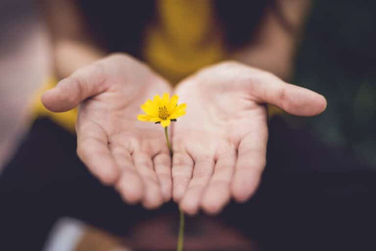 Woman with a yellow flower