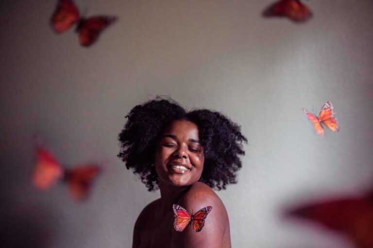 Woman surrounding with Butterflies