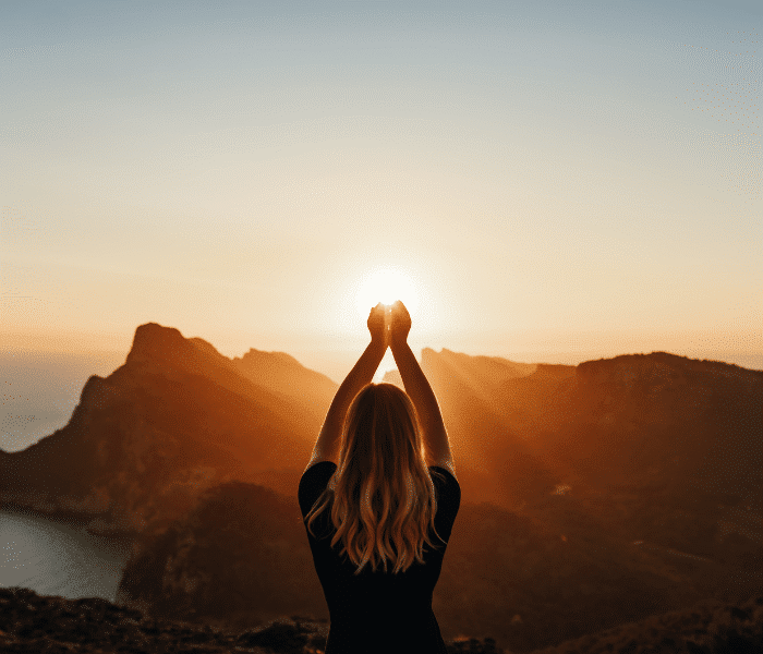 woman holding the sun